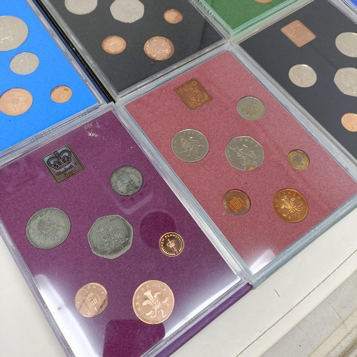 408 - A group of year proof coin sets, 1971-1983, and 1985-1986