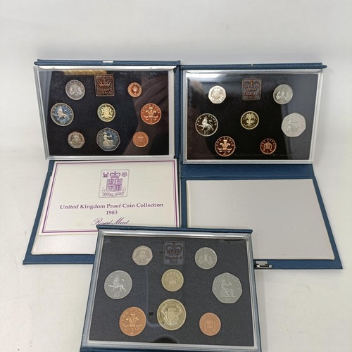 408 - A group of year proof coin sets, 1971-1983, and 1985-1986