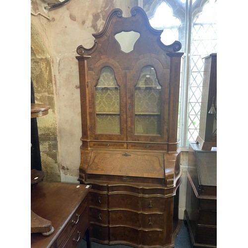 963 - An 18th century style Continental walnut bureau bookcase, 110 cm wide