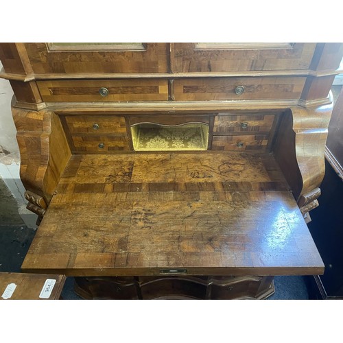 963 - An 18th century style Continental walnut bureau bookcase, 110 cm wide