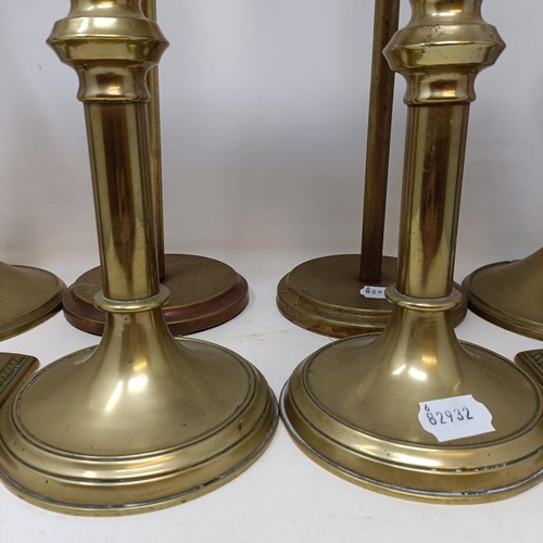 814 - A pair of large brass candlesticks, 44 cm high, and three other pairs (8)