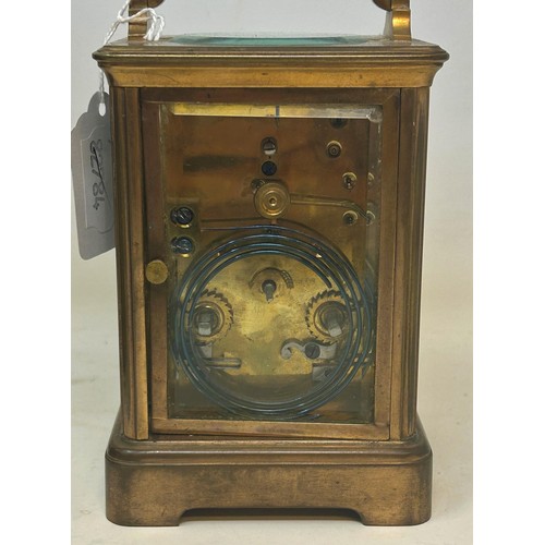 821 - A carriage clock, with an enamel dial, with Roman numerals, signed Mappin & Webb, in a brass and gla... 