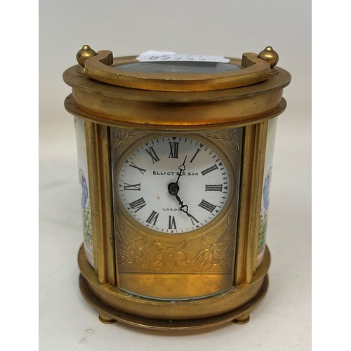 830 - A carriage clock, in an oval brass and glass case, 10 cm high, and a miniature carriage clock, 7 cm ... 