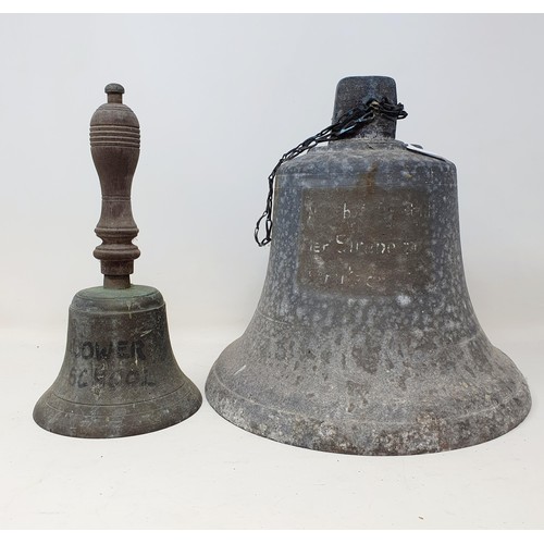 583 - A bronze ships bell, engraved, 27 cm diameter, and a school bell (2)