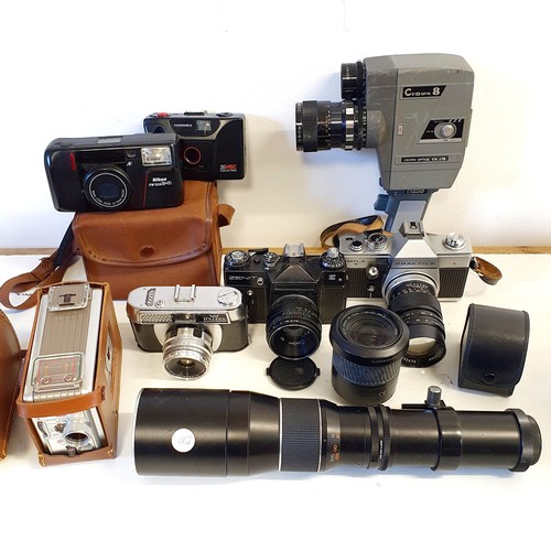 167 - A Zenit E camera, a Praktica MTL3 camera, assorted other cameras, lenses and photography equipment