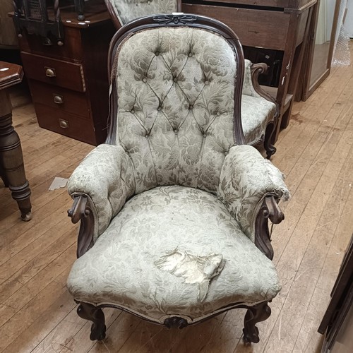 1021 - A mahogany framed button back armchair