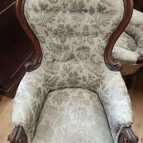 1022 - A mahogany framed button back armchair