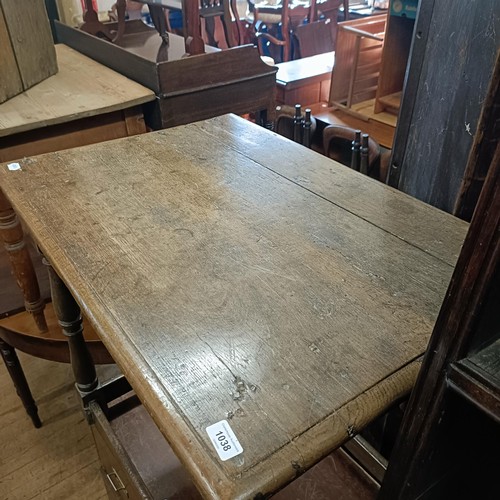 1038 - A 19th century oak side table, 83 cm wide