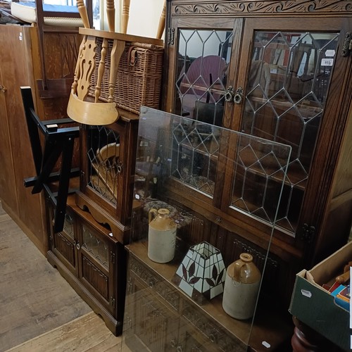 933 - An oak dresser, a matching side cabinet another, a pair of chairs, a glass topped table, a picnic ba... 