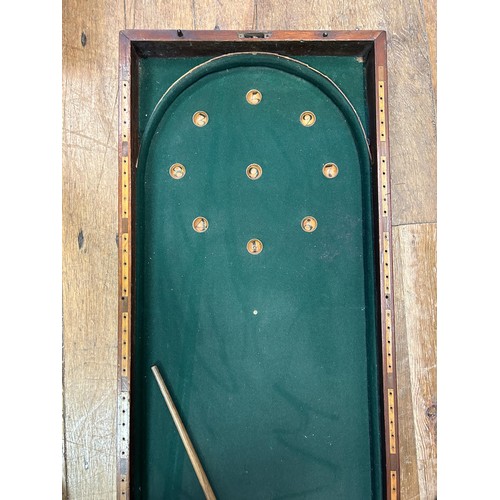 813 - A bagatelle board, in a mahogany case