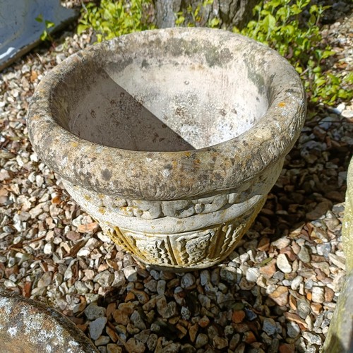 979 - A pair of square composite stone garden urns, 38 cm wide, and six others