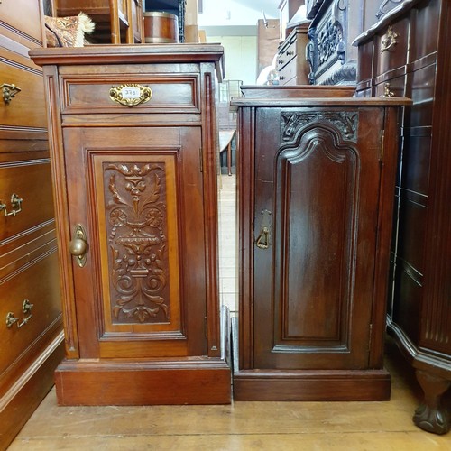 873 - A walnut pot cupboard, 41 cm wide, another similar, a barley twist standard lamp, and an Imbuia wood... 