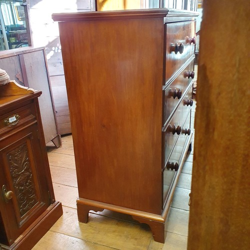 874 - A mahogany chest, having four drawers, 106 cm wide