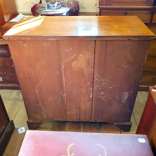 874 - A mahogany chest, having four drawers, 106 cm wide