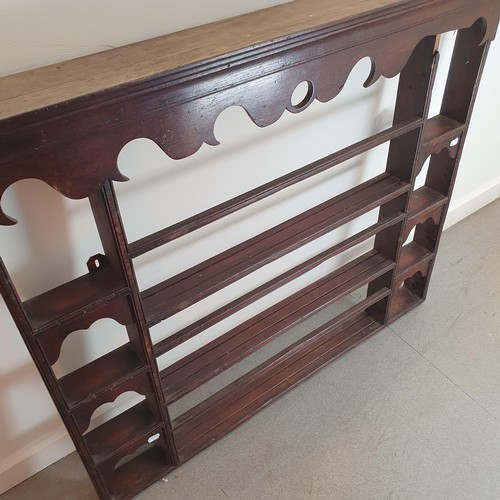 880 - An oak plate rack, 110 x 122 cm