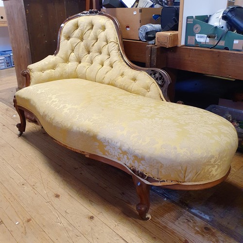 893 - A 19th century walnut framed chaise longue, 175 cm wide