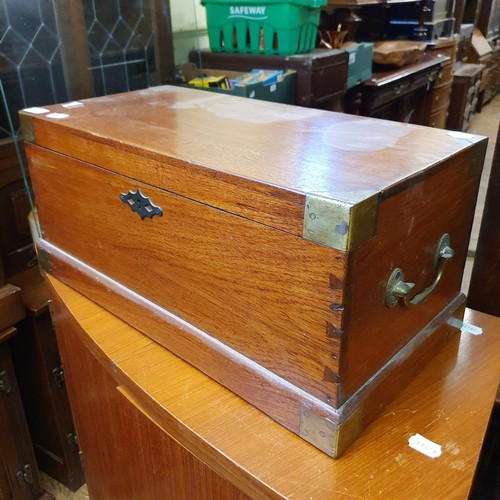 911 - A 1970's cocktail cabinet, 82 cm wide, a mahogany and brass bound box, a child's chair, a nest of oa... 