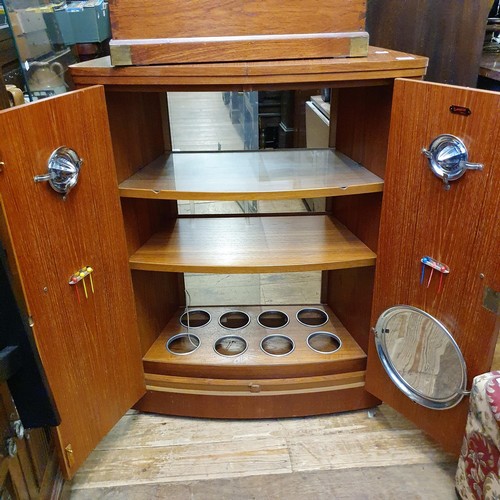 911 - A 1970's cocktail cabinet, 82 cm wide, a mahogany and brass bound box, a child's chair, a nest of oa... 