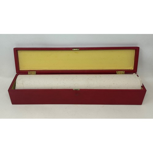 586 - A George V red leather scroll box, tooled and highlighted in gilt, with royal cypher, 50 cm wide