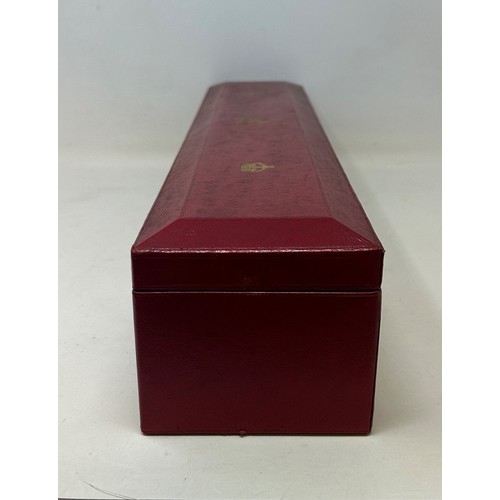 586 - A George V red leather scroll box, tooled and highlighted in gilt, with royal cypher, 50 cm wide