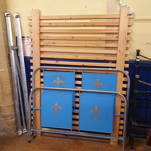 1073 - A metal double bed frame, 137 cm wide, along with a framed receipt for the bed, dated 1938 (2)