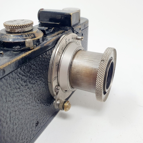 698 - A Leica 1 camera, No. 52140, in part leather case with an Elmar F=50mm 1:3.5 lens