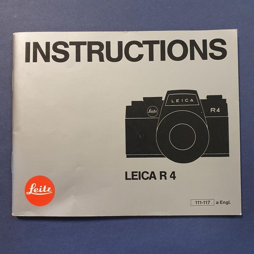 699 - A Leica R4 camera, No. 1609249, body only, and a manual