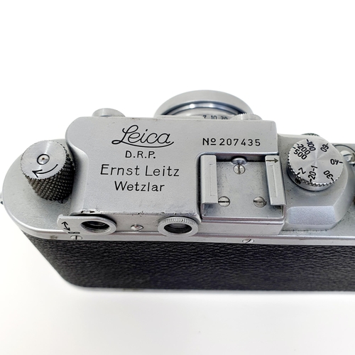 695 - A Leica IIIA Chrome camera, No 207435