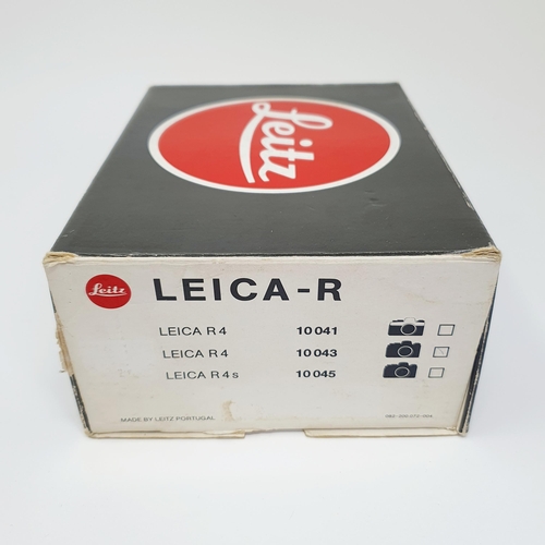 696 - A Leitz Leica R4 camera, boxed, No 1575566