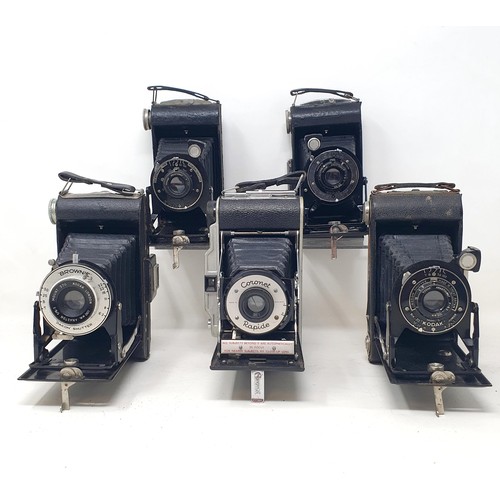 615 - A Brownie Model D box camera, a KNEB 16 mm cine camera, a Hawkeye box camera, a Brownie bellows came... 