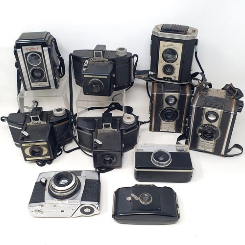 615 - A Brownie Model D box camera, a KNEB 16 mm cine camera, a Hawkeye box camera, a Brownie bellows came... 