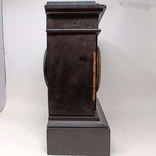 607 - A mantel clock, with a slate dial, and Roman numerals, to a twin train eight day movement, striking ... 