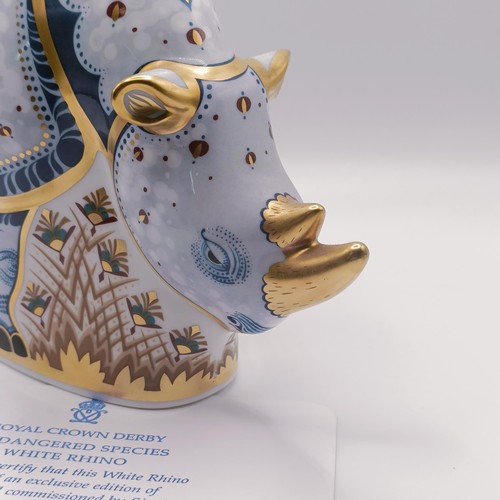 618 - A Royal Crown Derby limited edition paperweight, White Rhino, 405/1000, 21 cm wide, with a certifica... 