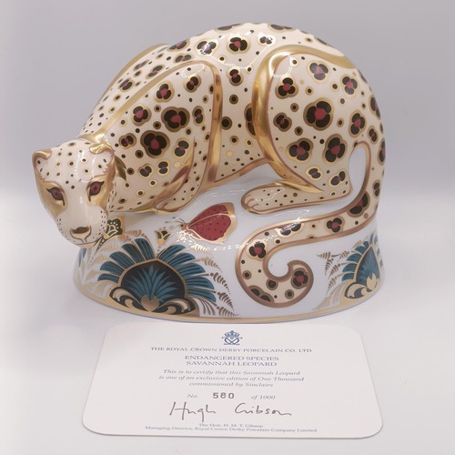 620 - A Royal Crown Derby limited edition paperweight, Savannah Leopard, 580/1000, 11 cm high, with a cert... 