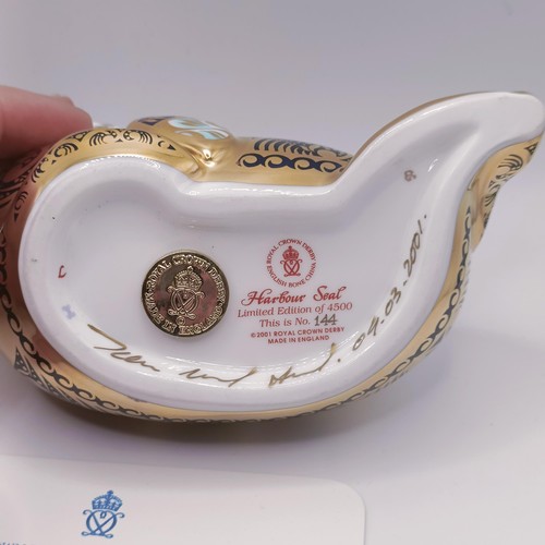 621 - A Royal Crown Derby limited edition paperweight, Harbour Seal, 144/4500, 14 cm wide, with a certific... 