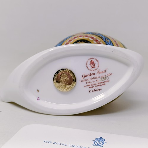 634 - A Royal Crown Derby limited edition paperweight, Garden Snail, 1510/4500, 7 cm high, with a certific... 