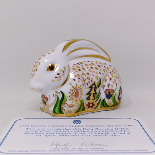 638 - A Royal Crown Derby limited edition paperweight, Millennium Dove, 725/1500, 15 cm wide, with a certi... 