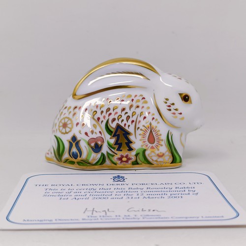 638 - A Royal Crown Derby limited edition paperweight, Millennium Dove, 725/1500, 15 cm wide, with a certi... 