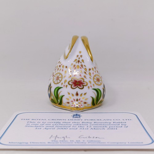 638 - A Royal Crown Derby limited edition paperweight, Millennium Dove, 725/1500, 15 cm wide, with a certi... 