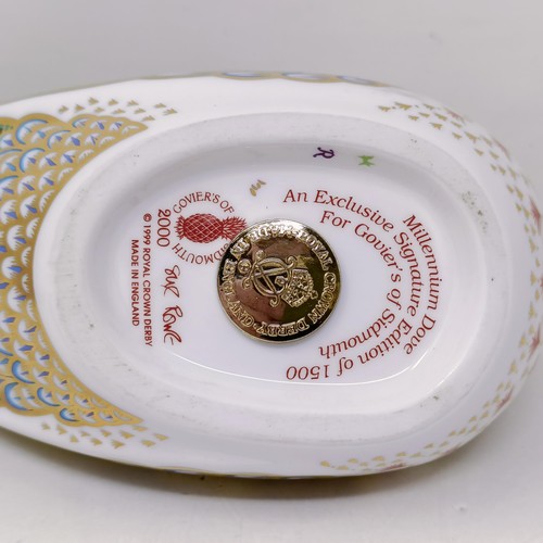 638 - A Royal Crown Derby limited edition paperweight, Millennium Dove, 725/1500, 15 cm wide, with a certi... 