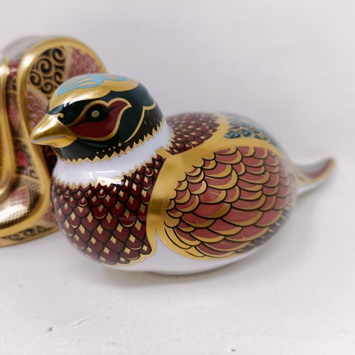 641 - A Royal Crown Derby paperweight, Old Imari Snake, 9 cm high, boxed, and Woodland Pheasant, 18 cm wid... 