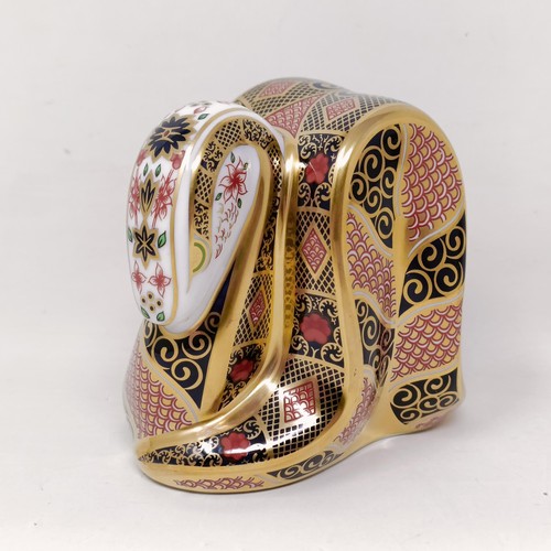 641 - A Royal Crown Derby paperweight, Old Imari Snake, 9 cm high, boxed, and Woodland Pheasant, 18 cm wid... 