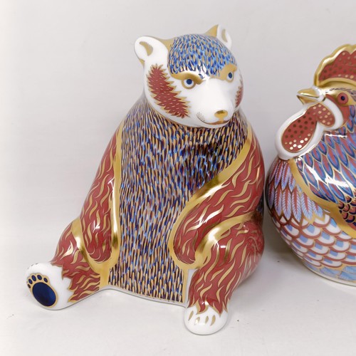 644 - A Royal Crown Derby paperweight, Honey Bear, 11 cm high, boxed, and a cockerel, 9 cm high, boxed (2)... 