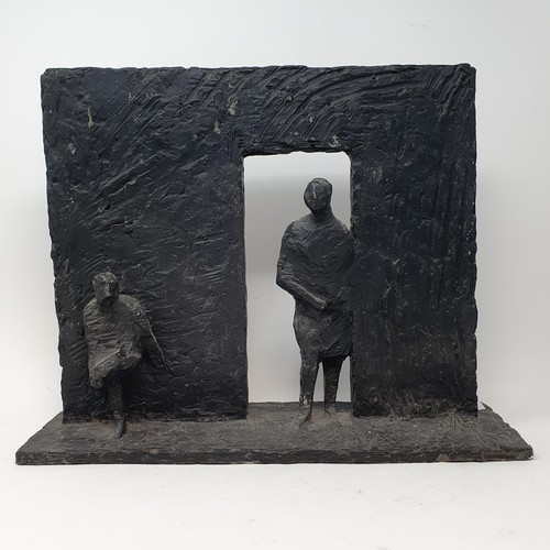 301 - G Harris, a figure of a man in a doorway, resin, signed, 33 x 41 cm