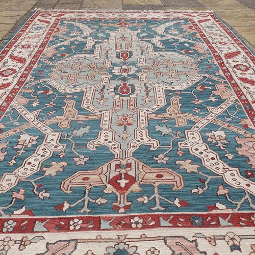 825 - A Sumak green ground carpet, 268 x 180 cm