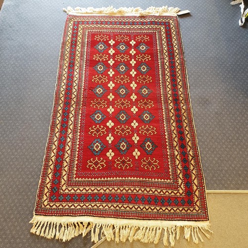 826 - A Kasak red ground rug, 170 x 100 cm