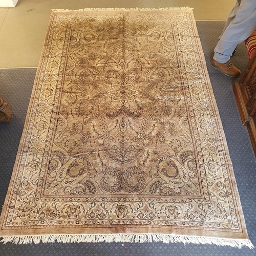 832 - A Kashmiri silk cream ground carpet, 272 x 180 cm