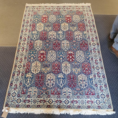 824 - A part silk Persian city cream ground rug, 200 x 134 cm