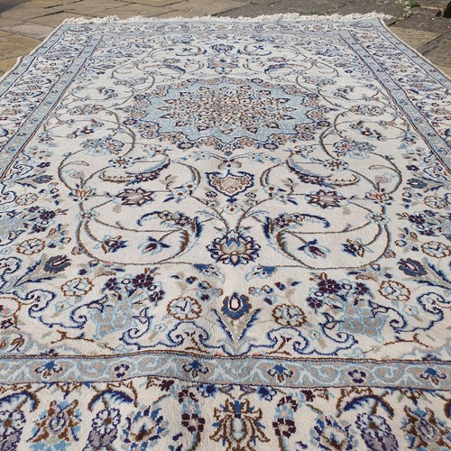 854 - A Persian Nain cream ground carpet, 295 x 200 cm