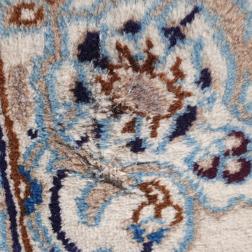 854 - A Persian Nain cream ground carpet, 295 x 200 cm